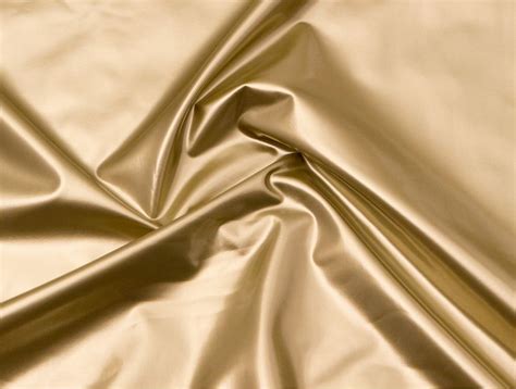 gold and gray metallic fabric|metallic gold on cream fabric.